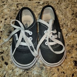 The Authentic Black and White Toddler Lace-Up Van's